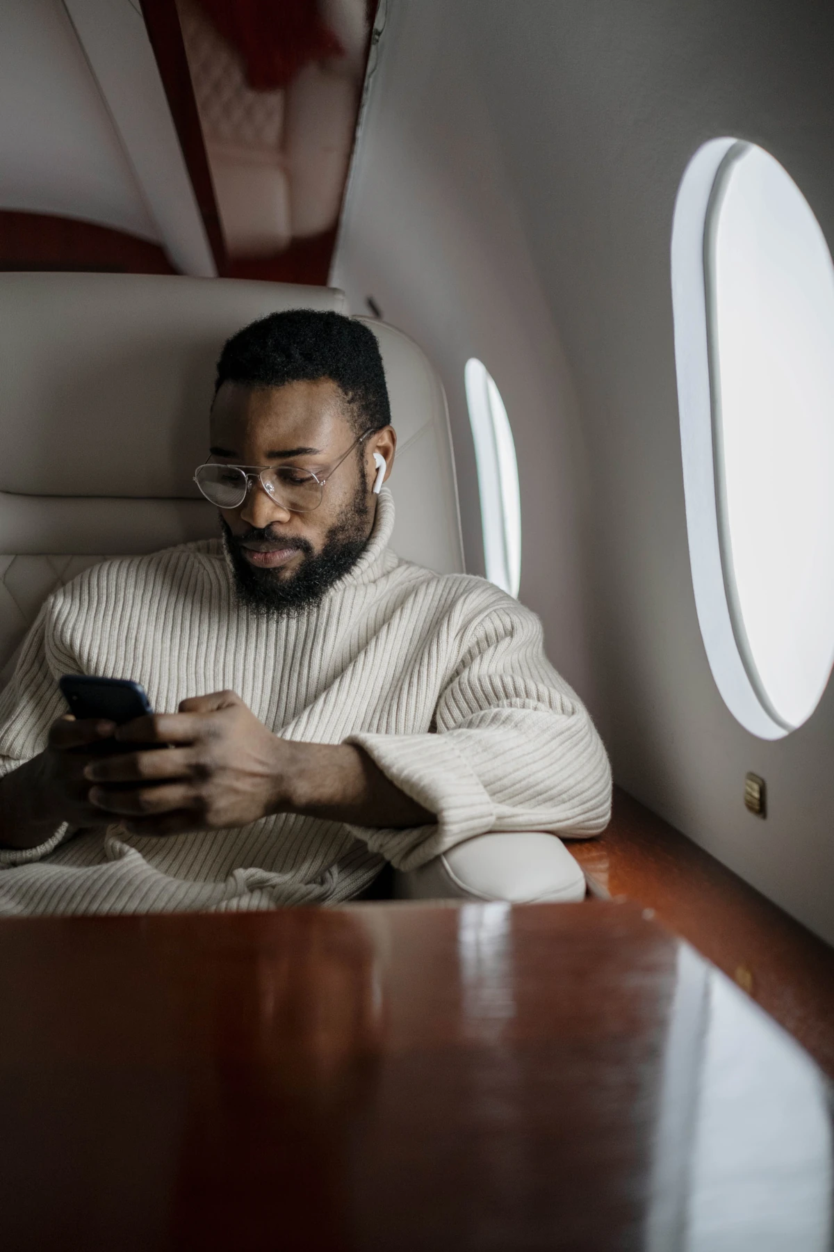 Traveller managing finances on phone